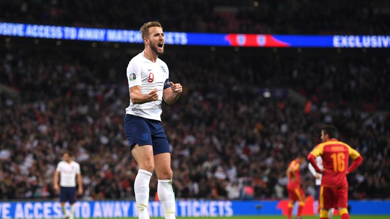 Harry Kane celebrates his hat-trick against Montenegro