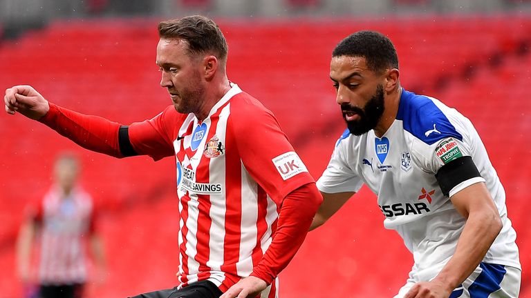  Aiden McGeady of Sunderland battles for possession with Liam Feeney of Tranmere Rovers during the Papa John's Trophy Final