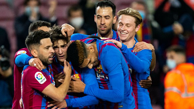 Barcelona celebrate their late win over Elche