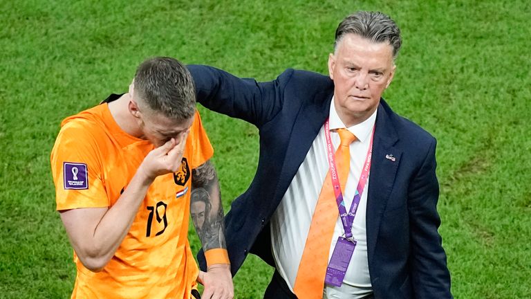 Weghorst is consoled by head coach Louis van Gaal