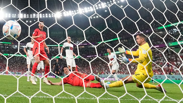South Korea's Young-Gwon Kim scores their equaliser