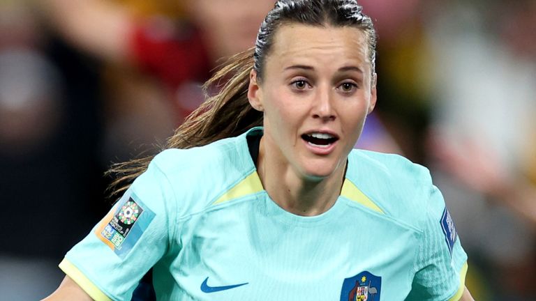 Australia's Hayley Raso celebrates after scoring her side's second goal during the Women's World Cup Group B soccer match between Australia and Canada in Melbourne, Australia, Monday, July 31, 2023. (AP Photo/Victoria Adkins)