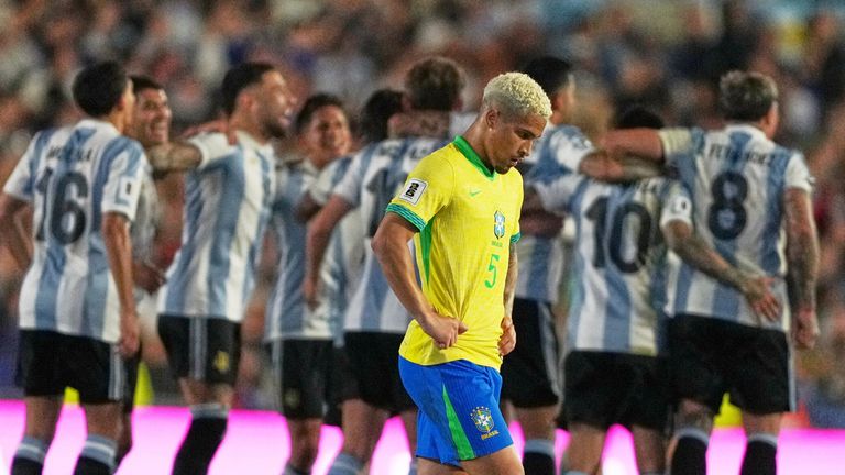 Brazil's Joao Gomes walks off the field after his side's 1-4 lost against Argentina in a World Cup 2026 qualifying soccer match at Monumental Stadium in Buenos Aires, Argentina, Tuesday, March 25, 2025. (AP Photo/Natacha Pisarenko)
