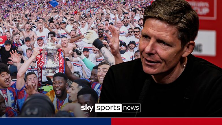Crystal Palace players celebrate with the trophy after the FA Cup final between Manchester City and Crystal Palace at the Wembley Stadium in London, Saturday, May 17, 2025. (AP Photo/Ian Walton)