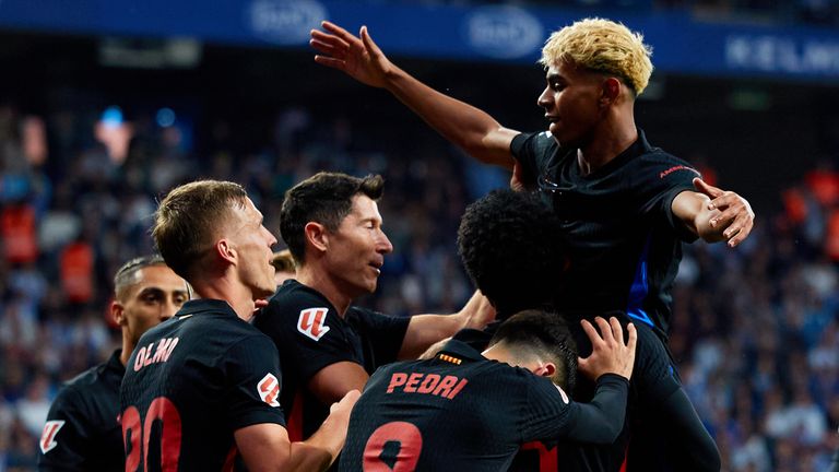 Lamine Yamal celebrates with his team-mates after scoring against Espanyol to put Barcelona on course for the LaLiga title