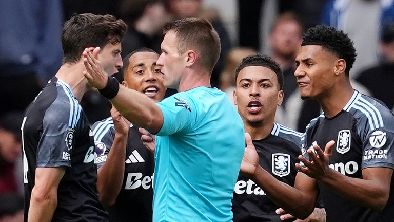 Aston Villa's Morgan Rogers (centre right) and team-mates react after referee Thomas Bramall disallows his goal