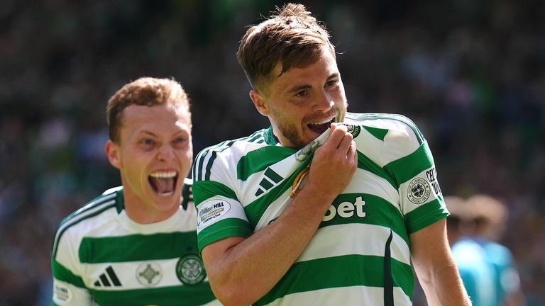 James Forrest celebrates after scoring a late equaliser for Celtic against St Mirren
